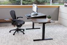 Load image into Gallery viewer, wood adjustable desk, sit-to-stand base model in plank coffee oak with black finish
