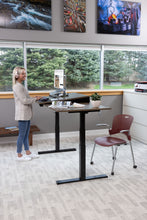 Load image into Gallery viewer, wood adjustable desk in standing position, plank coffee oak in black finish
