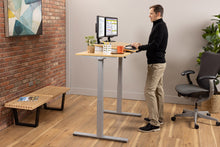 Load image into Gallery viewer, wood adjustable desk, sit-to-stand base model in sand maple with silver finish
